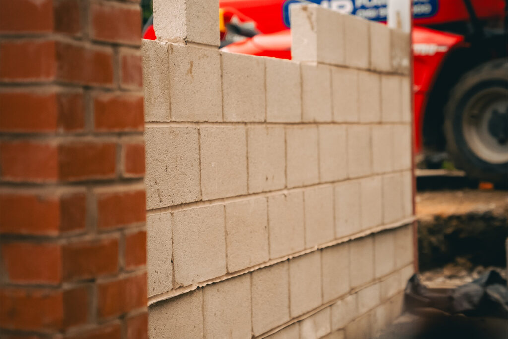 Experienced bricklayers working on a project in Cheshire